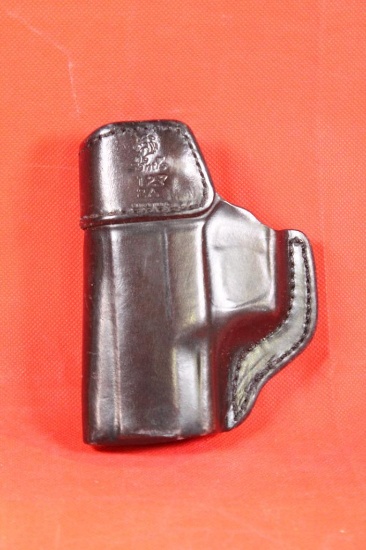 De Santis black leather left handed belt clip holster. Used in good condition.