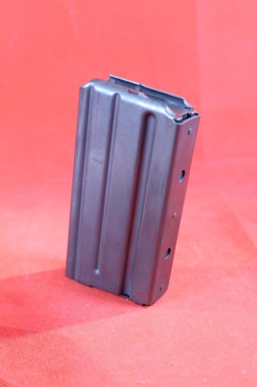 One 10 round Colt AR-15 magazine. New.