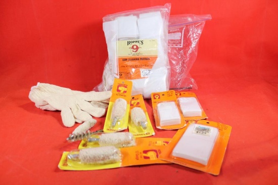 Two bags of gun cleaning supplies. One cleaning patches and one shotgun mops and brushed. New.