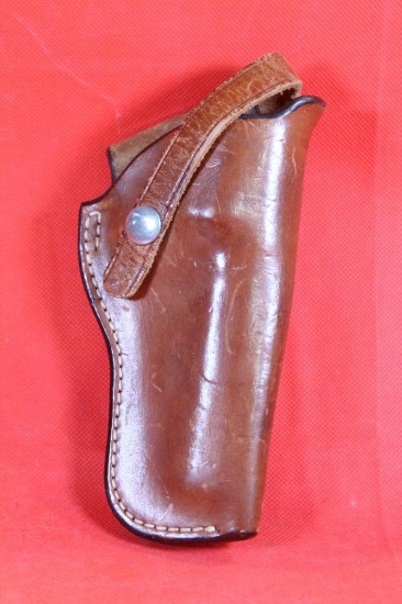 Ray's Leather right handed trigger loop holster for S&W, Colt revolver 4". Used in good condition.