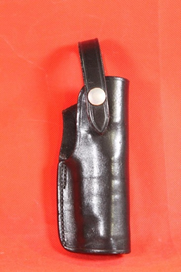 Bianchi black leather right handed snap holster for S&W 9mm.