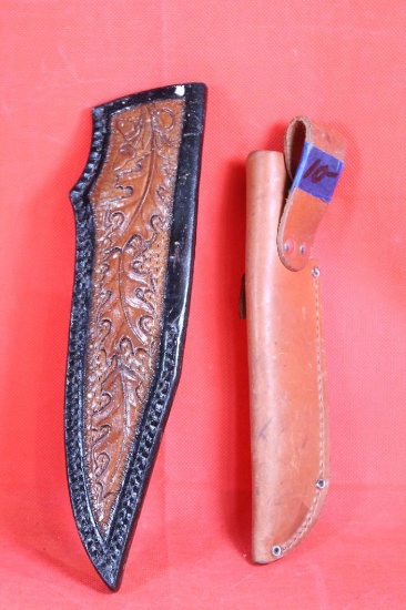 Two leather knife sheaths.