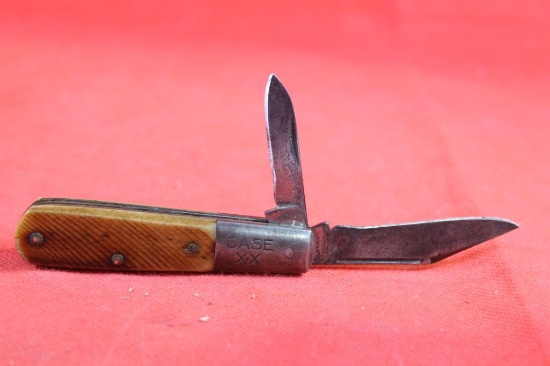 Case XX Barlow with 2.5 inch main blade. Sawcut synthetic scales. Used.