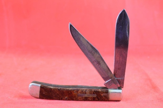 Bulldog Brand Large trapper with 4.25 inch blades. Brown synthetic scales. Main blade has engraving