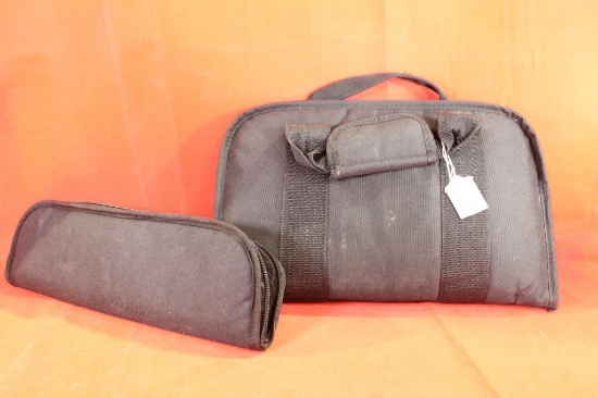 Two nylon padded zippered cases. Like new.