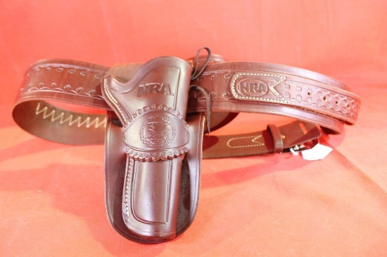 Dark brown leather NRA gun belt and holster. Size 48/50. New.
