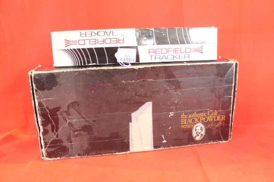 One Colt black powder pistol box and one Redfield scope box.