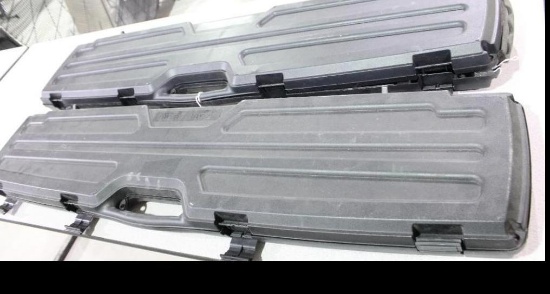 Two 48 inch plastic, foam lined single rifle cases. Used