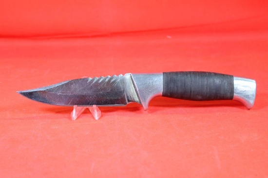 Handmade sheath knife with 5.0 inch blade, aluminum handle with leather washers. No markings on
