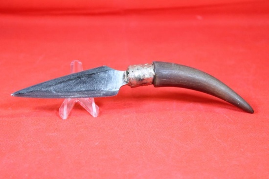 Small spear point sheath knife with 3.5 inch blade. Leather sheath. Appears hand made.