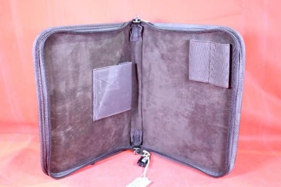 Garrison grip Small brown zippered folder case. Used in good condition