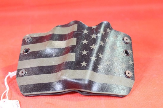 Hard plastic belt pistol holster for micro auto. Used in good condition.