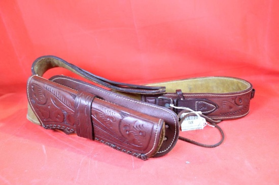 Hand made, suede lined old west style right hand holster with belt. Holds 7 1/2" to 8" revolver, 12