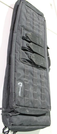 One Drago soft sided padded zippered AR rifle case.Used in good condition.