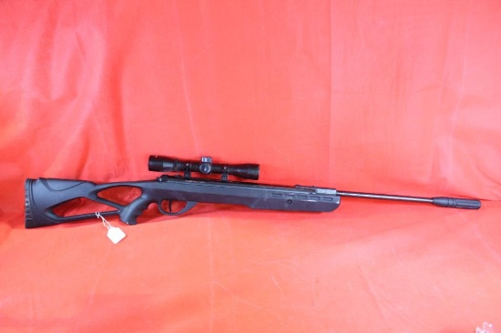 Umbrex barrel cock air rifle, synthetic stock with Umbrex 4x32 duplex rifle scope. As new.
