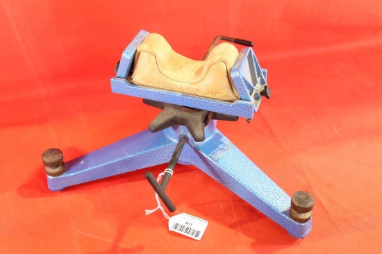 Midway cast iron rifle rest with leather sand filled barrel rest. Look new.