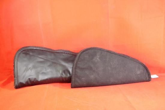 Two soft padded zippered pistol cases. One medium and one large.