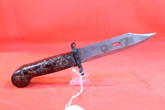 Bayonet, possibly Soviet or Chinese, with 6.0 inch blade. Metal sheath with leather belt attachment.