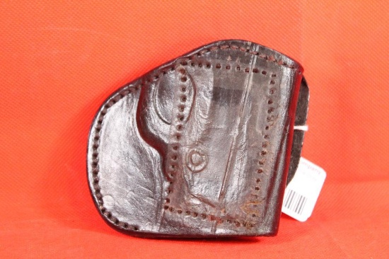 Texas 1838 multi draw black leather holster for smaller automatic. Used in good condition.