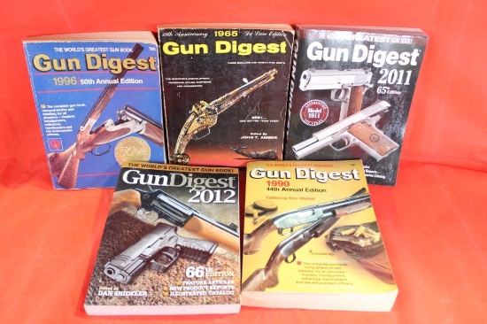 Five paperback Gun Digest's. 1965, 1990, 1996, 2011 and 2012.