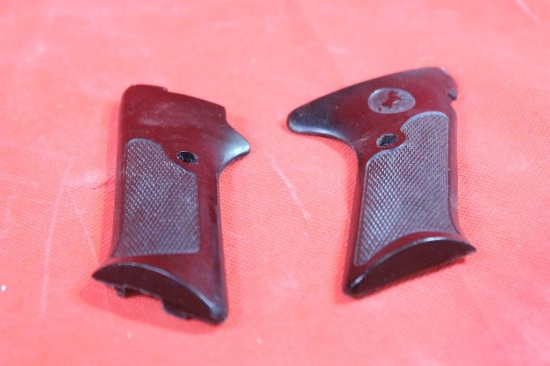 One set of Colt 22 automatic pistol grips.