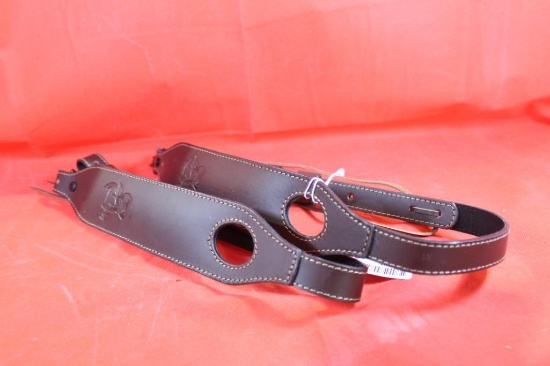 Two wide leather wide padded rifle slings.