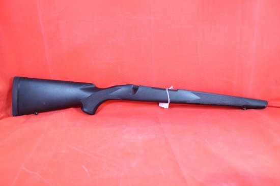 Winchester model 70 short action right handed synthetic rifle stock.