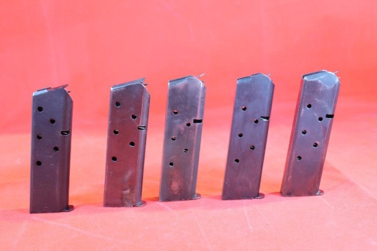 Five 45 ACP 7 round magazines. Used.