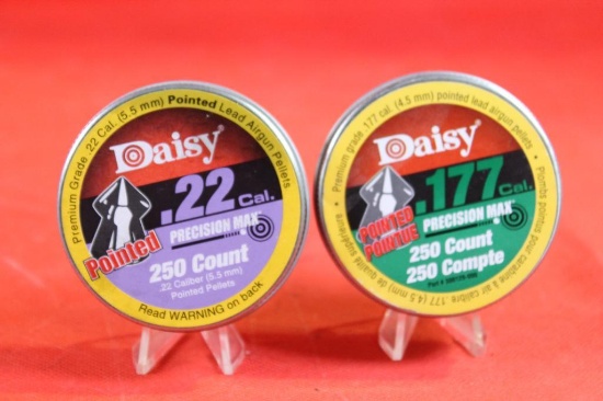 Two cans of Daisy air rifle pellets. One .177 and one 22 cal. New.
