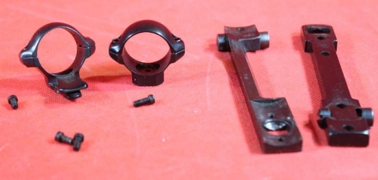 Two one piece scope mount and one set of rings. Used.