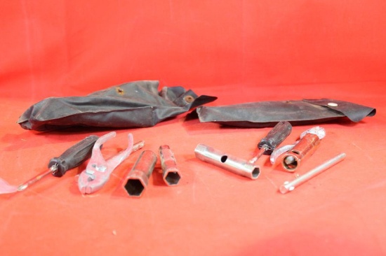 Two tool kits in plastic carry bags. Used.
