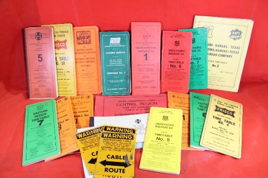 Two boxes of miscellaneous railroad time tables.
