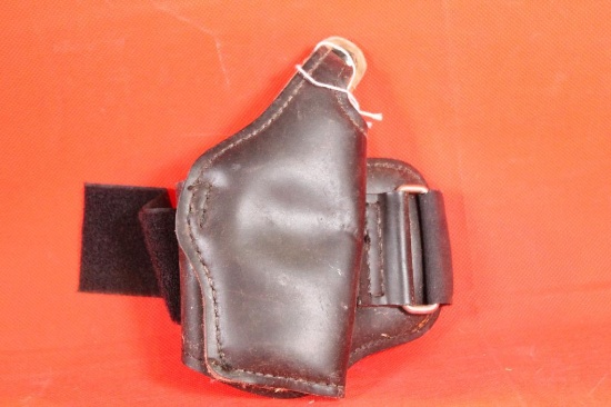 Black leather ankle holster. Used.