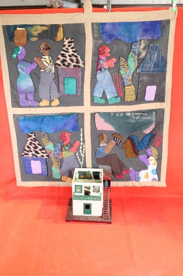 Small handmade infant quilt inside a small pocket a written story describing the scenes and two