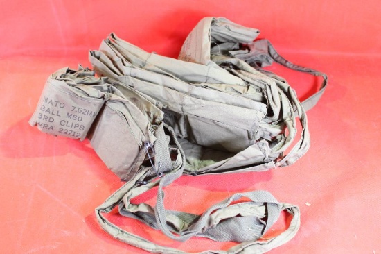 Six green military cloth bandoliers. No ammunition.