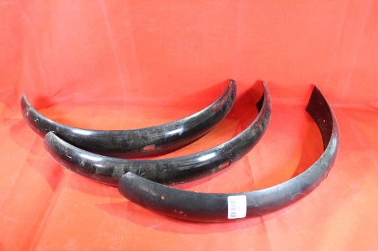 Three black metal bicycle fenders. Used.