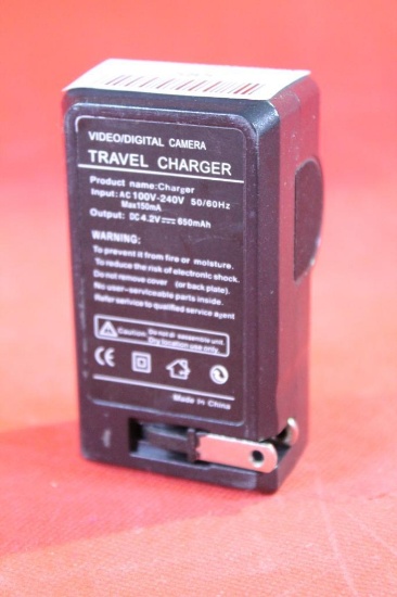 Travel charger for 3.7V video and digital camera batteries