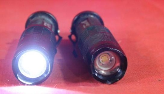 Two 4" Ultrafire flashlights, one works other one needs batteries