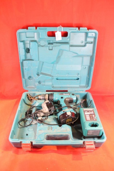 Makita cordless drill 14.4V with two batteries, and charger in hard case