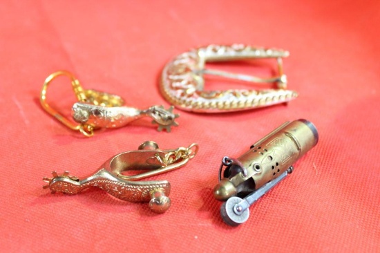 Antique brass "trench" lighter, Two spur keychains and a silver plated belt buckle