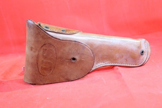 Brown leather U.S. revolver web belt holster. Used in nice condition.