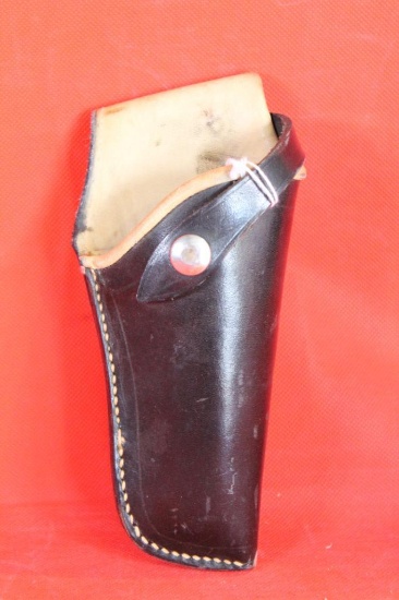 Black leather Elk hide lined right handed holster for S&W K22. Used in good condition.