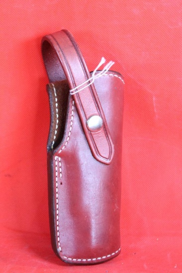 Red/brown leather ROSS right handed holster for 1911. Looks new.