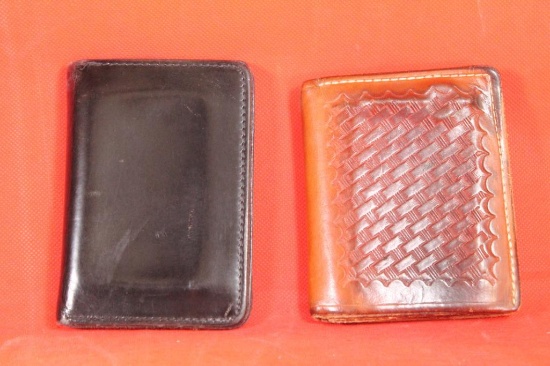 Two badge wallets, one black leather and one tan leather basket weave
