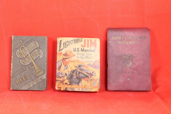 Three small books, one Lightning Jim US Marshall (copyright 1940), one 1943 USMA Bugle Notes, and