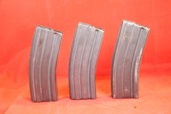 Three metal 30 round AR-15 magazines. Used in good condition.