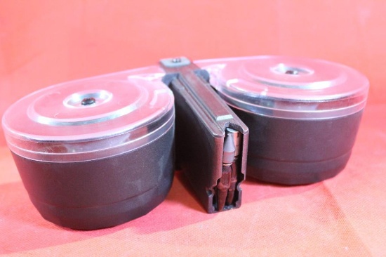 One KCI AR15 100 round mag with feed clip assembly and nylon carry bag