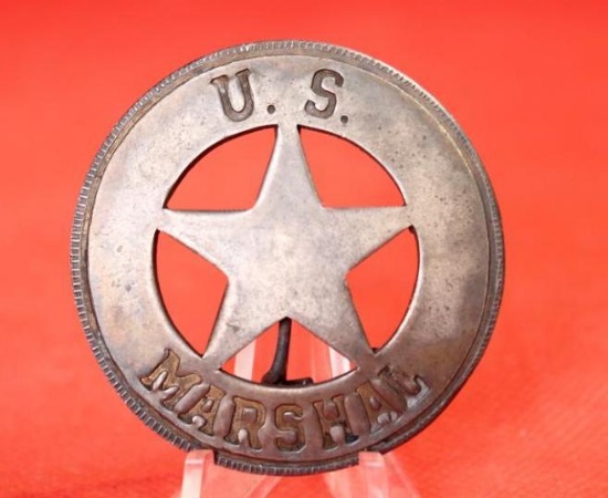 US Marshal badge, stamped MGM Studios on back