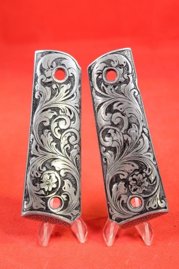 Metal 1911 grips with Fleur De Lis design. Like new.