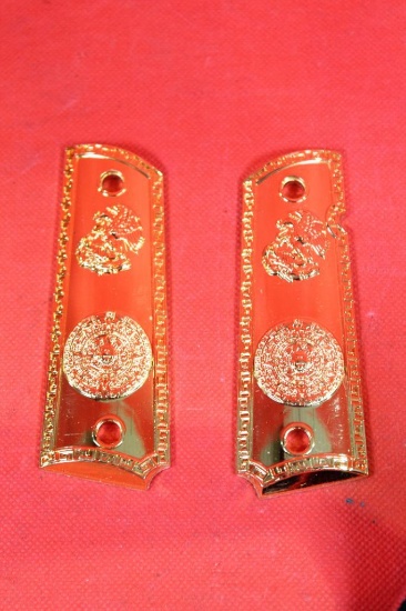 Gold colored metal grips for 1911 with Mexican design, like new